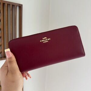 Coach Burgundy Zip Around Wallet with Gold Logo